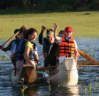 A group of tourists thrilled by a catamaran ride in Sri Lanka