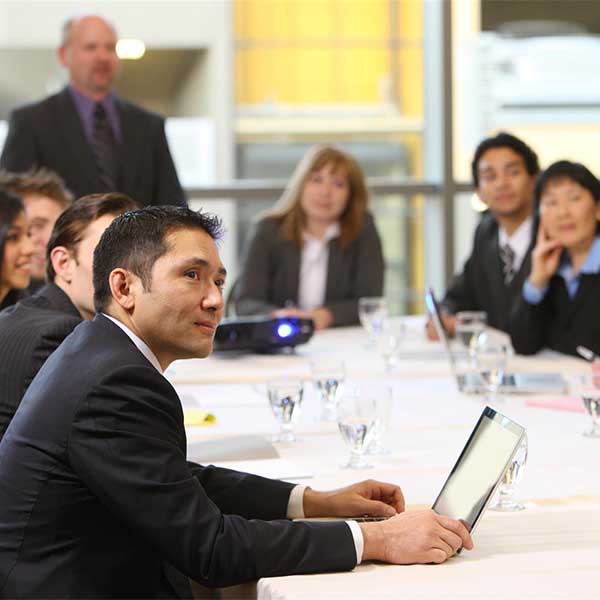 Corporate staff at a board room discussion