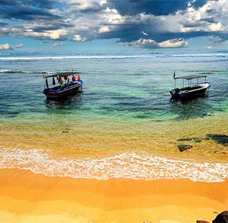 Fishing boats over picturesque waters near Hikkaduwa shores