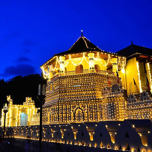 The Temple of the Tooth decorated for Perahera