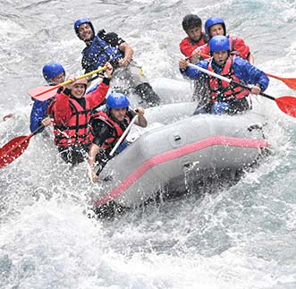 Experiencing thrills of extreme sports- White Water Rafting.